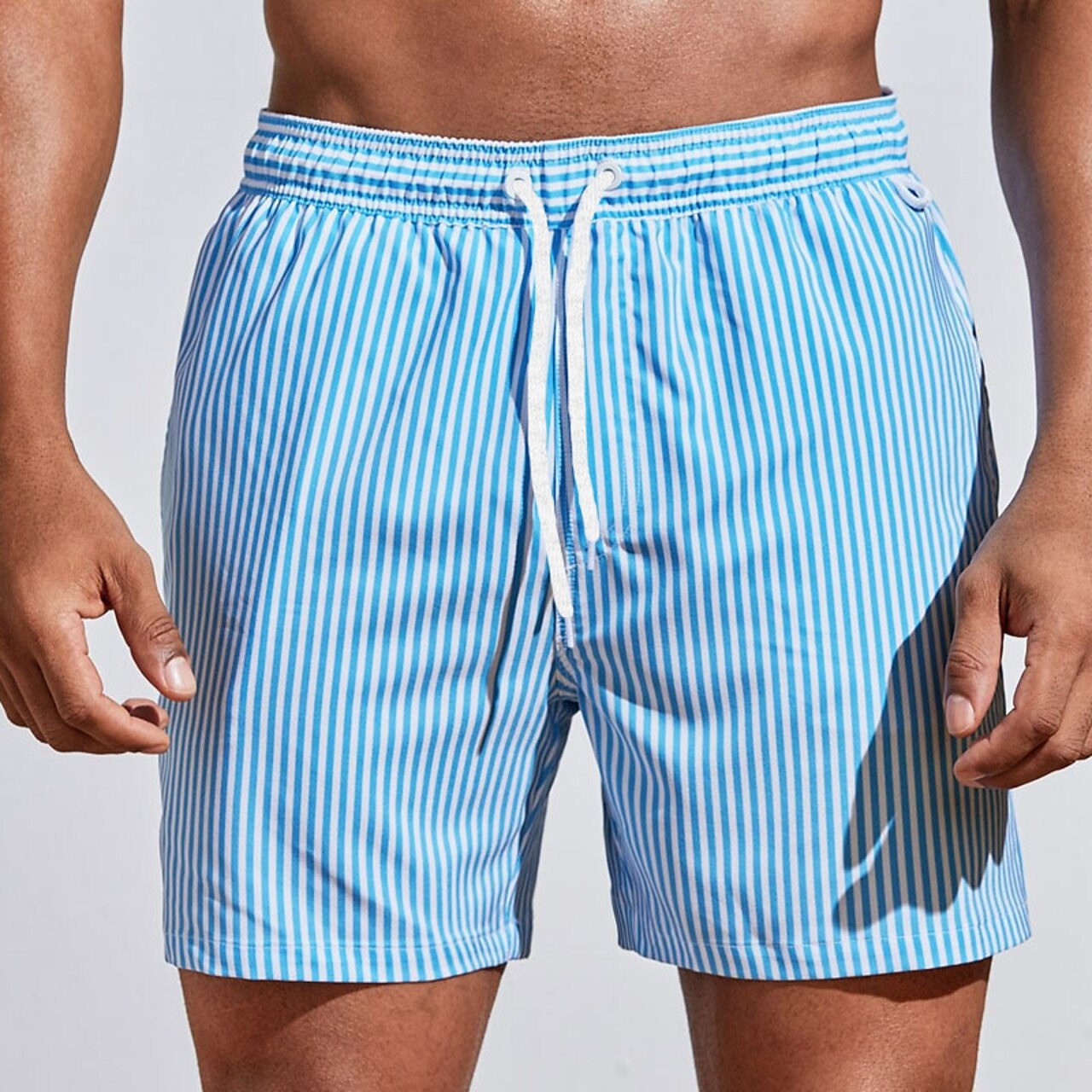 Image of Roger | Men's Striped Swim Shorts